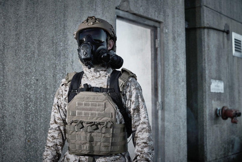 Soldier wearing a helmet and respirator