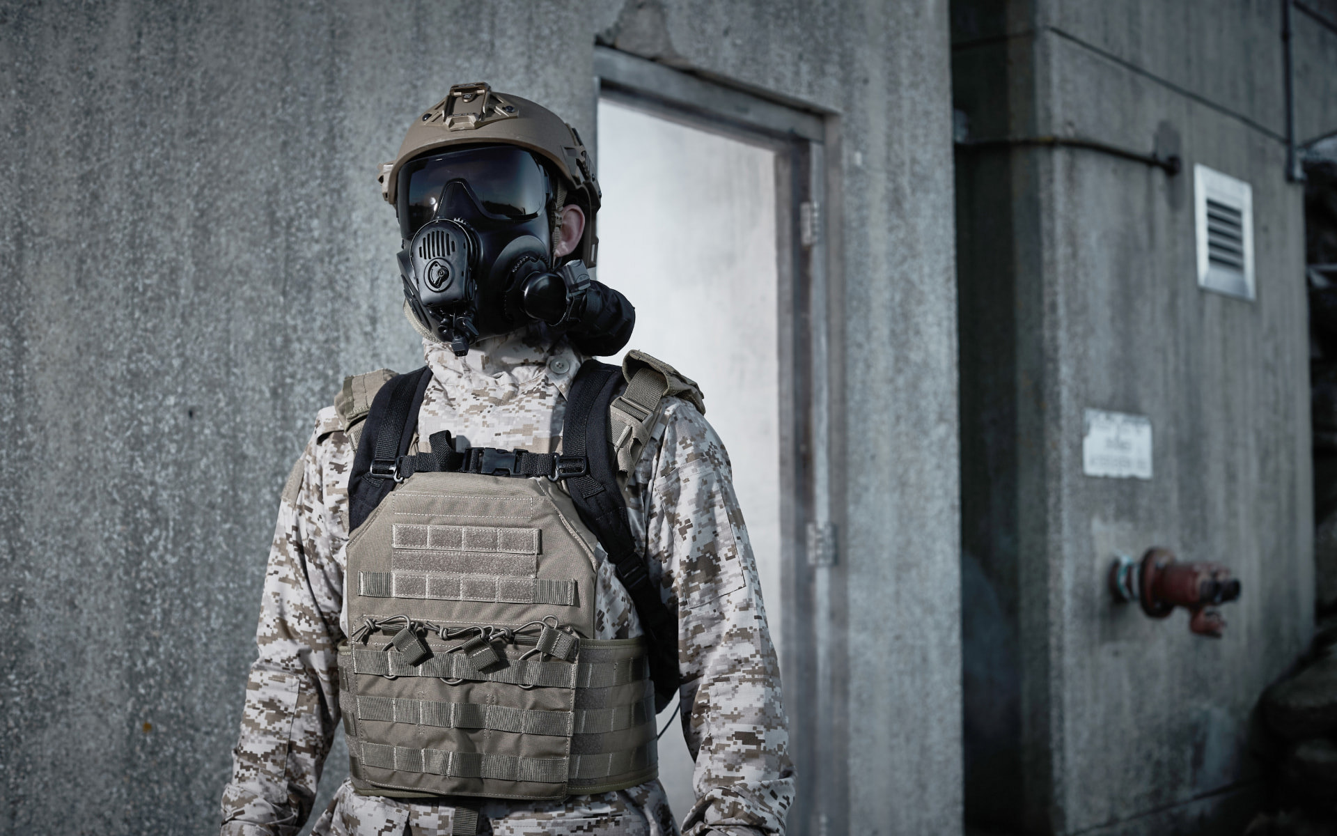 Soldier wearing a helmet and respirator