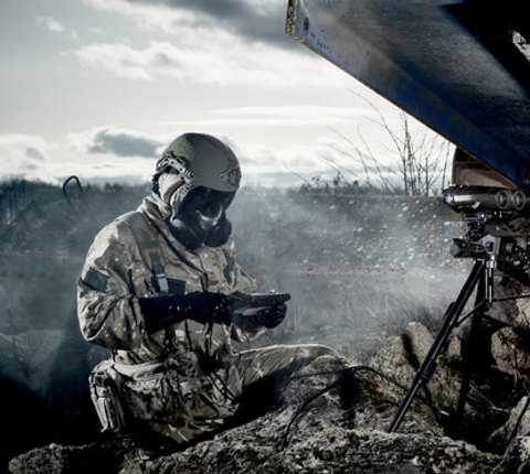 Soldier wearing a helmet and respirator