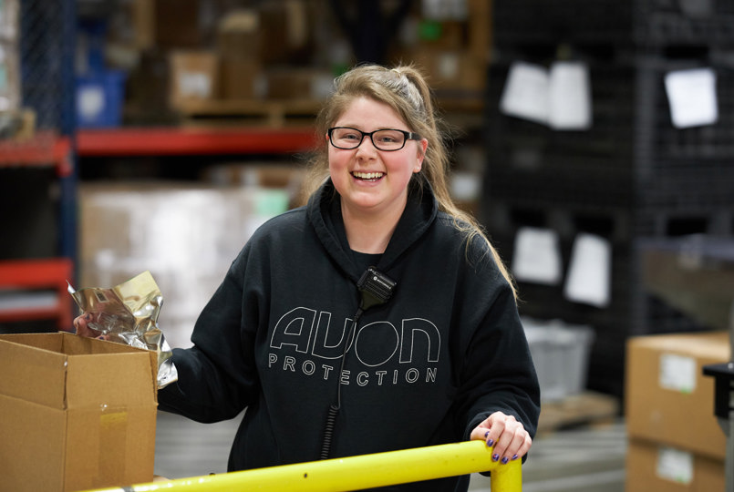 Employee smiling on the production line