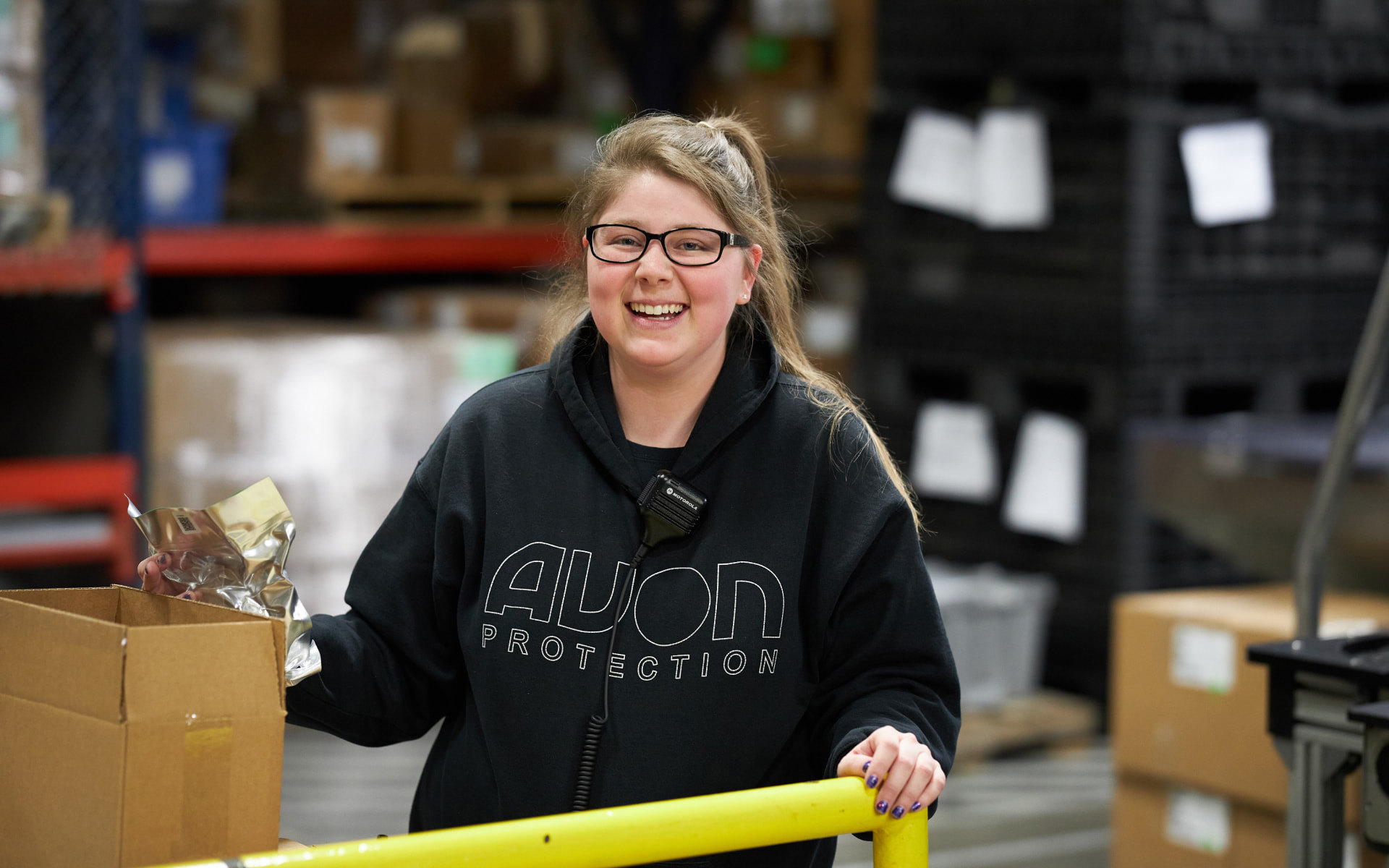 Employee smiling on the production line