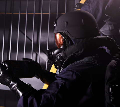 Soldier wearing a helmet and respirator