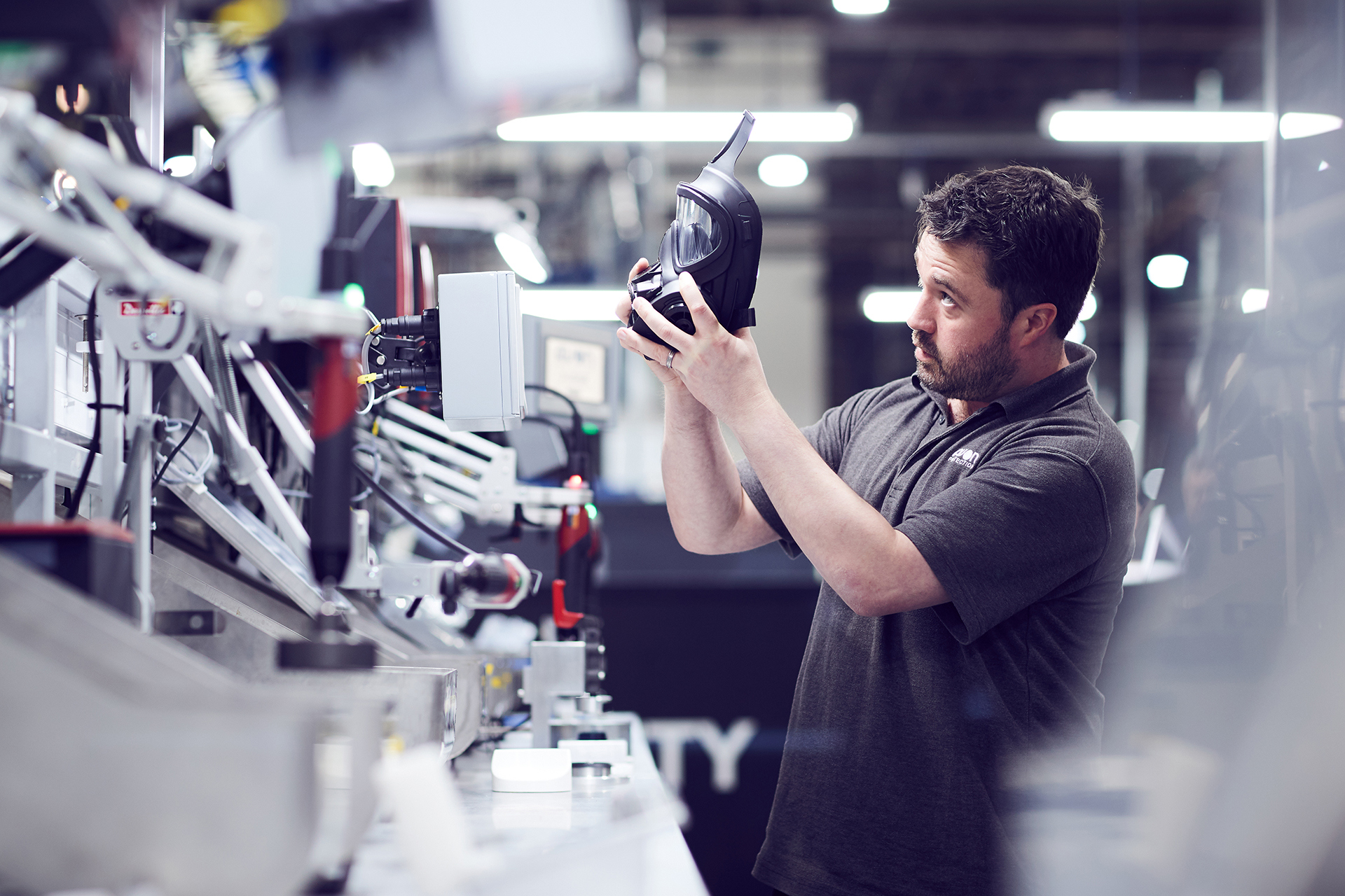 Employee quality inspecting respirator