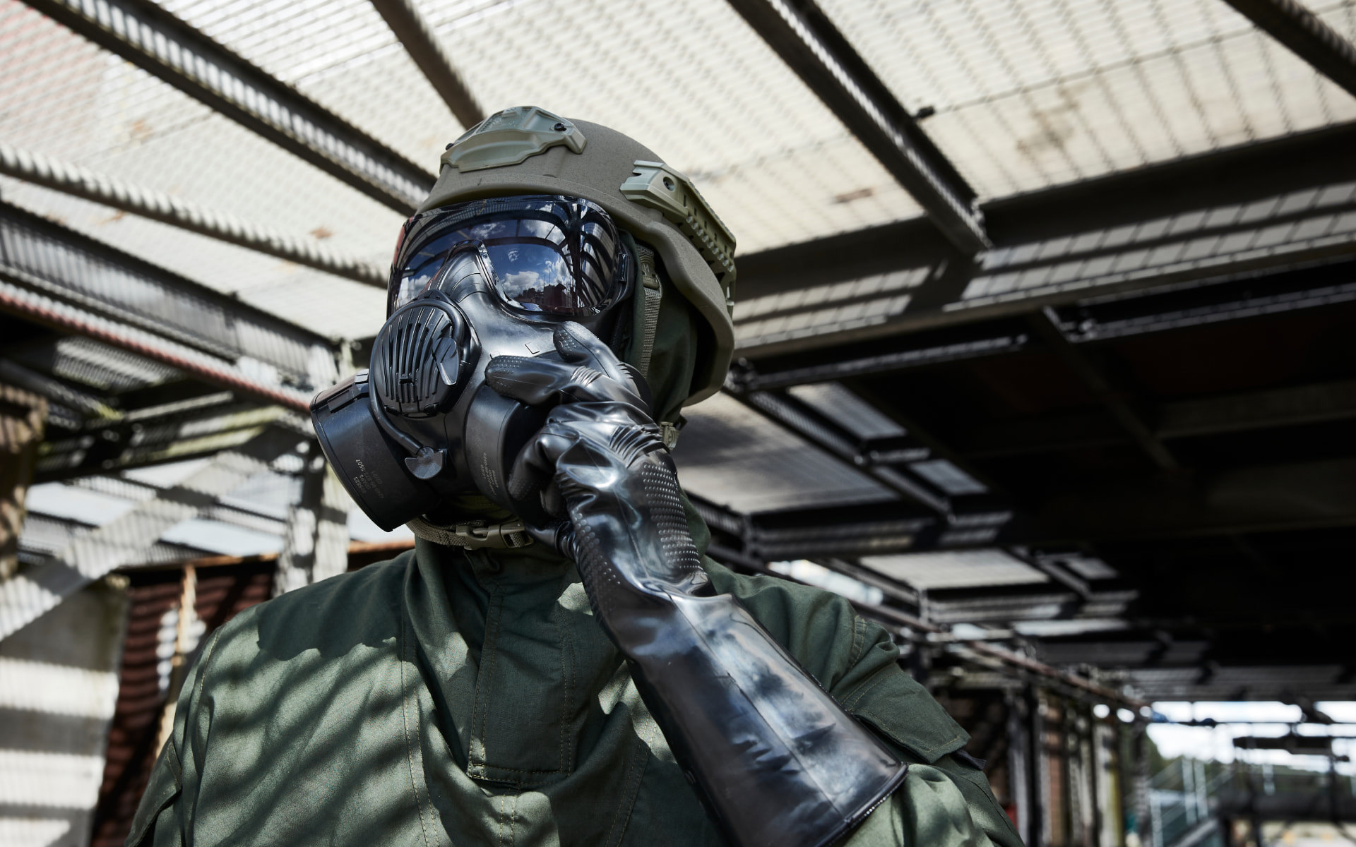 Soldier wearing a helmet and respirator